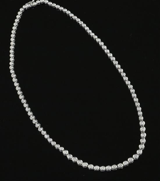 A modern Italian 18ct white gold and graduated diamond spectacle necklace, 41.5cm.